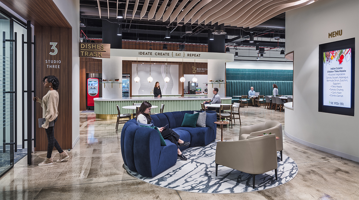 The central corridor of The Gym leads to the café. Studios break off from the corridor as spaces for meetings and breakout rooms.