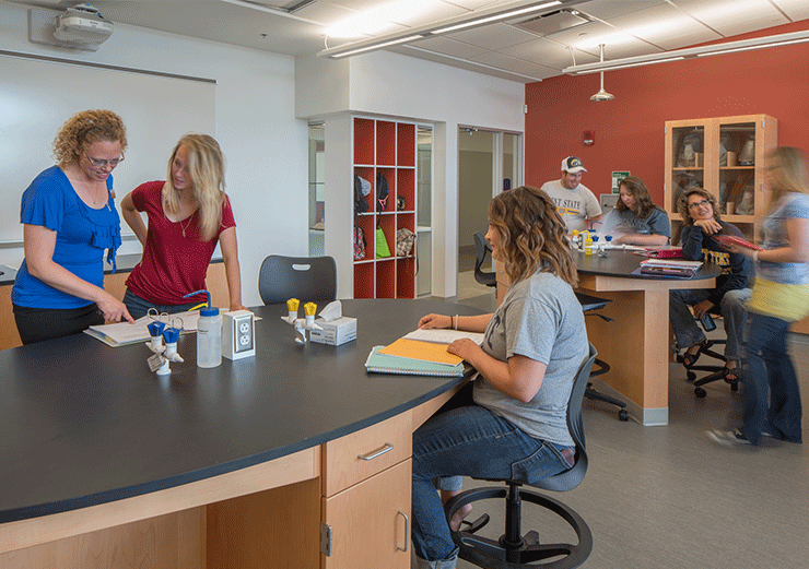 Students congregating in the lab at the Stark Science and Nursing building.
