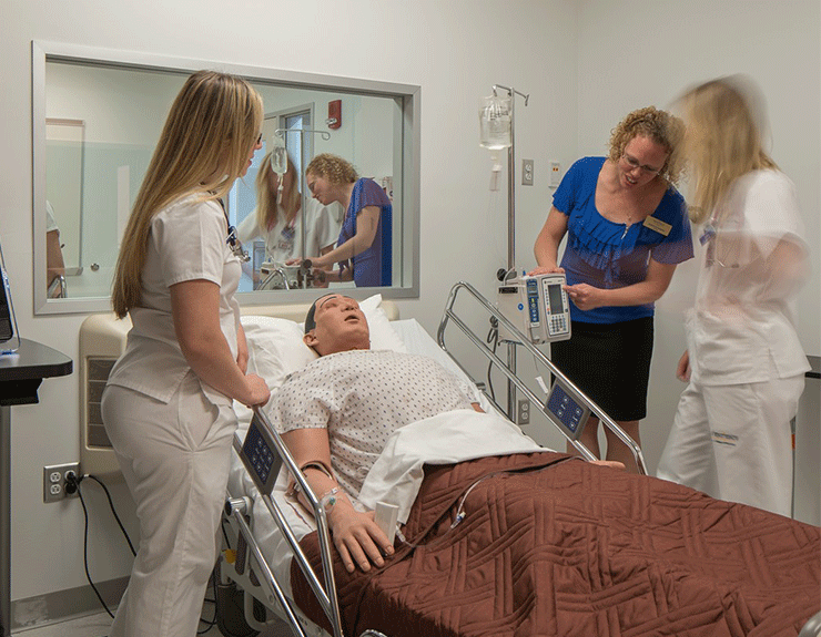 Students practicing hands-on skills in the Stark Science and Nursing building