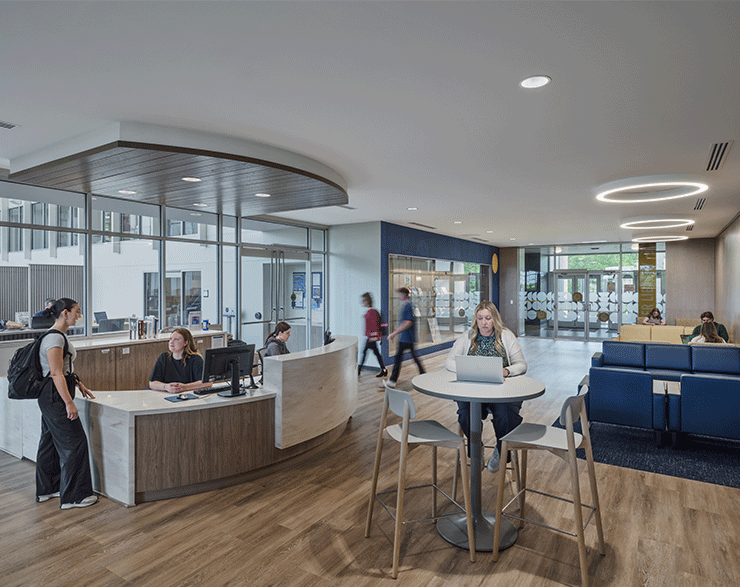 Users enjoying the lobby in the Alter Library at Mount St. Joseph University.