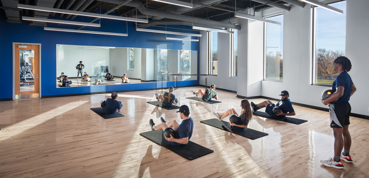 People working out in the Mount St. Joseph University multipurpose group fitness room