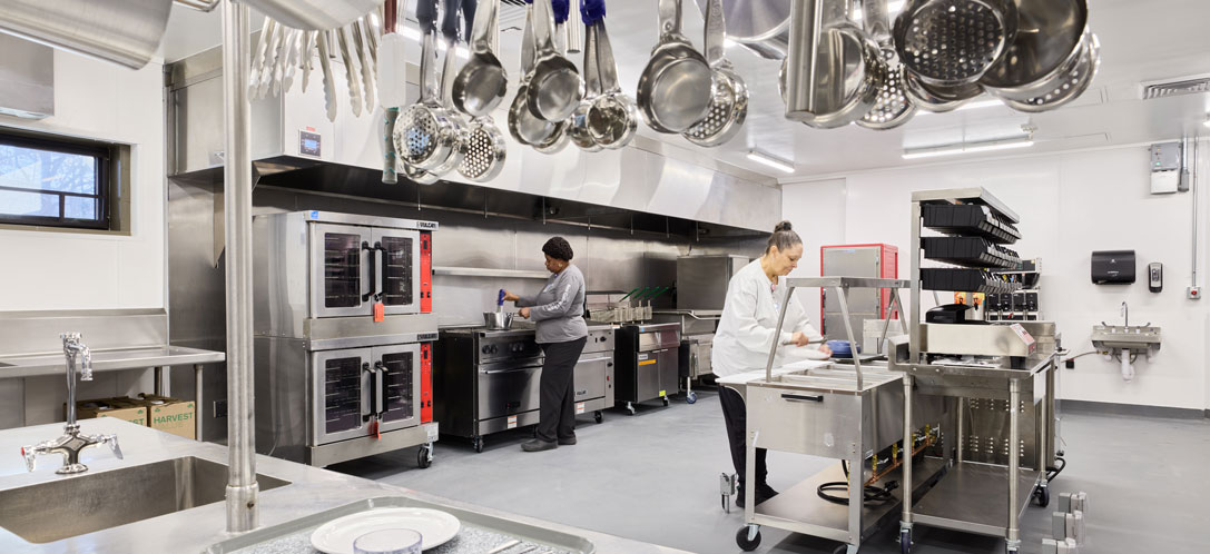 Employees working in the UNC Rex RNCC Kitchen