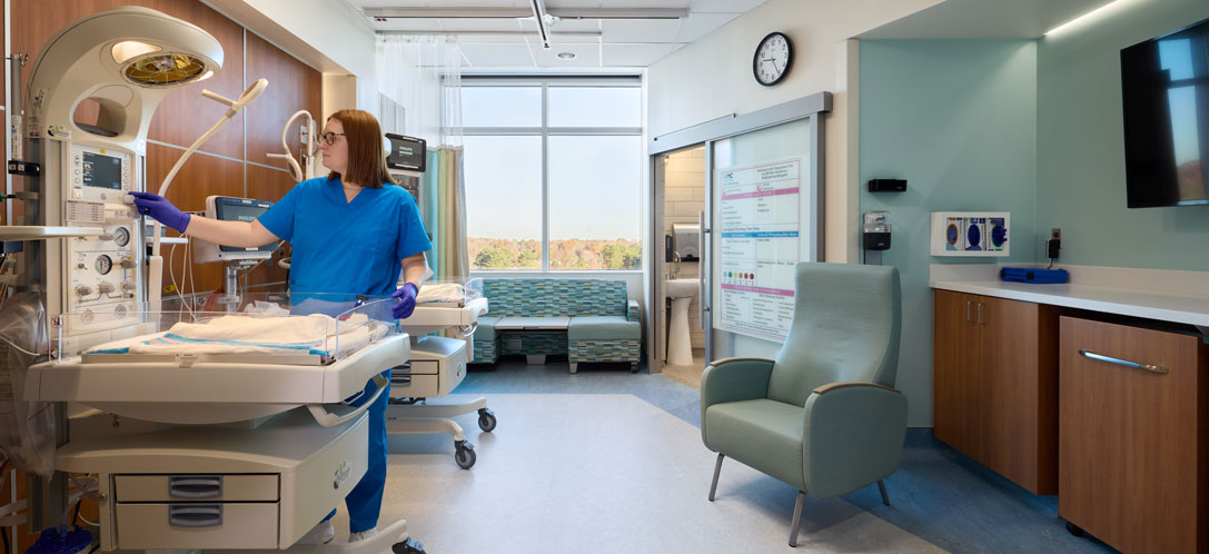 Woman working in the newly renovated NICU at UNC Health Rex Holly Springs