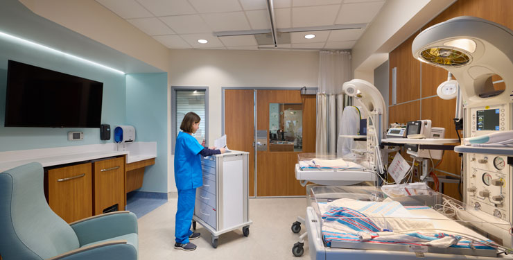 Woman working in the newly renovated NICU at UNC Health Rex Holly Springs