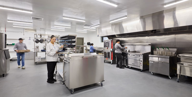 Employees working in the UNC Rex RNCC Kitchen