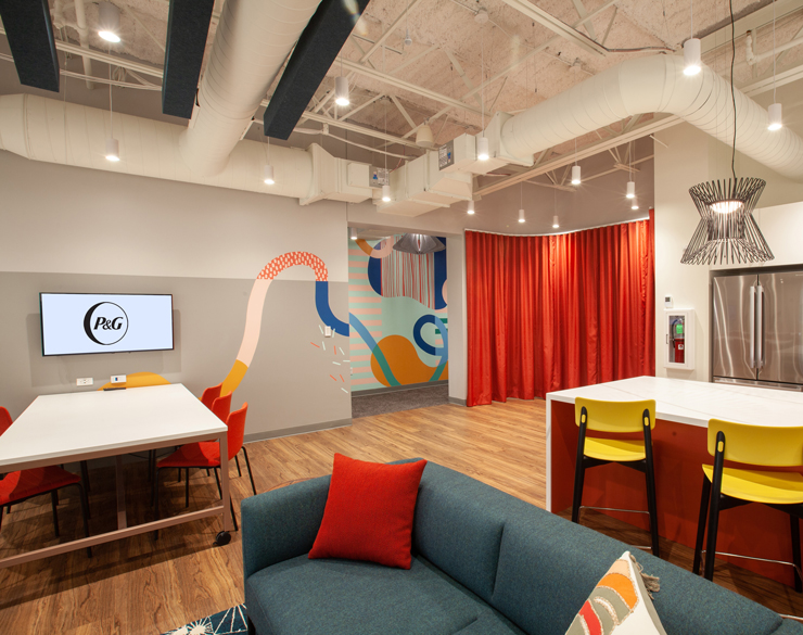 A colorful and brightly lit break area at P&G's Rhode Island sales office