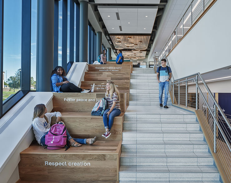 Students gather on the large feature stair
