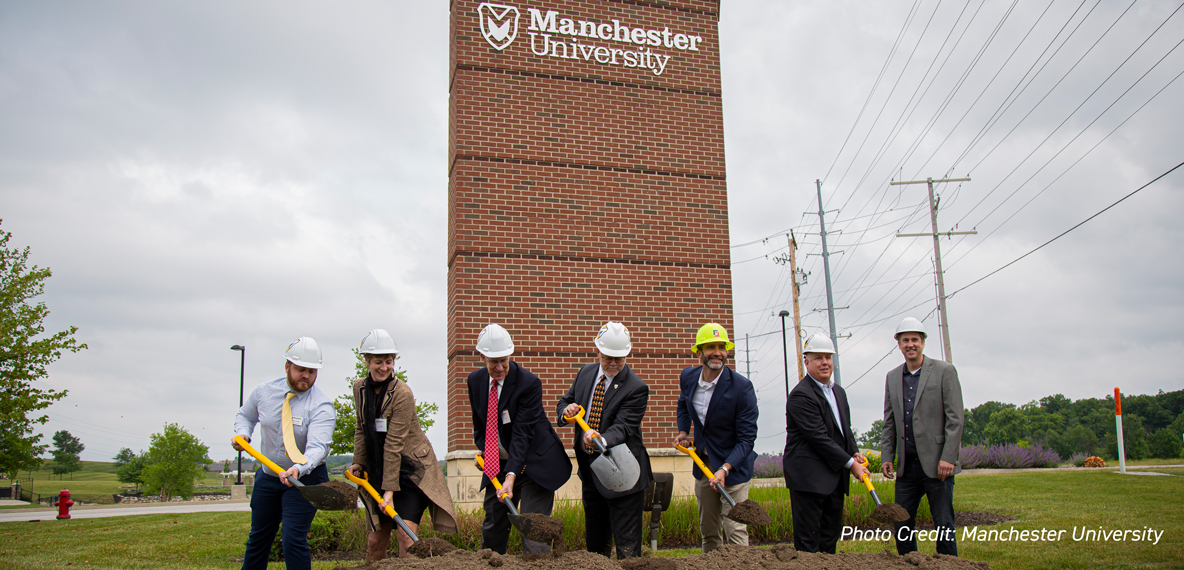 Campus leaders and partners shovel dirt at Manchester University's Fort Wayne campus