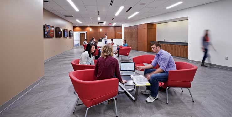 Students work together inside the research commons